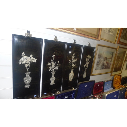 3189 - A set of four Japanese black framed mother of pearl pictures of vases