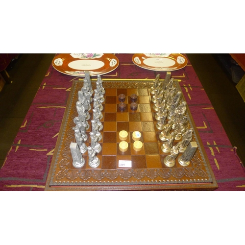 3207 - A leather chess board and box with a set of metal chess men and wooden draughts