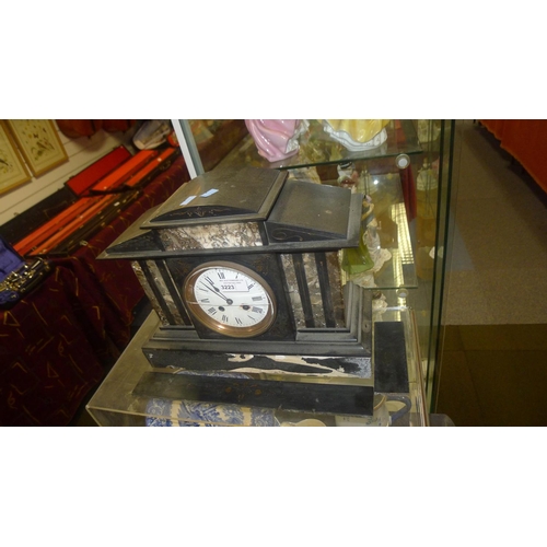 3223 - An Edwardian slate and marble temple style mantel clock with a circular dial and Roman numerals