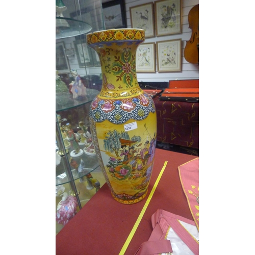 3239 - A tall multi-coloured figure decorated Chinese vase approximately 61 cm tall