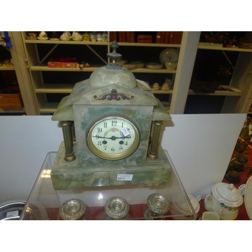 3277 - A Victorian green mottled onyx cased temple style mantel clock