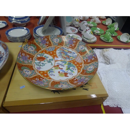 3285 - A multi-coloured Chinese decorated charger with wooden box approx 45 cm diameter