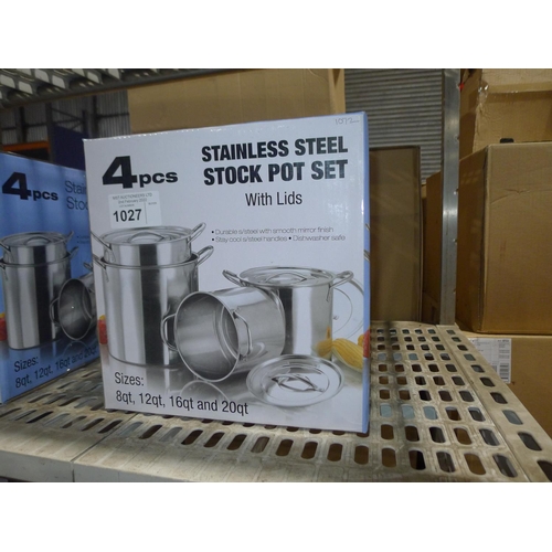 1027 - A 4 piece stainless steel stock pot set with lids