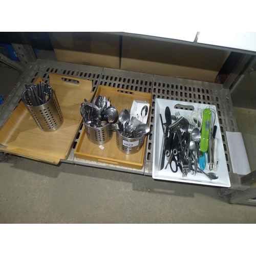 1029 - A quantity of various cutlery and cutlery pots