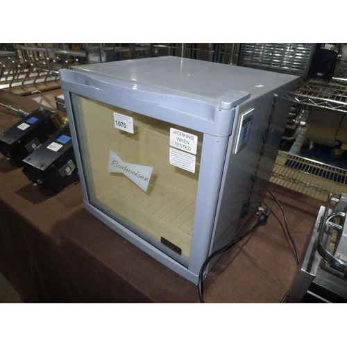 1070 - A countertop Budweiser branded mini fridge by Husky - trade