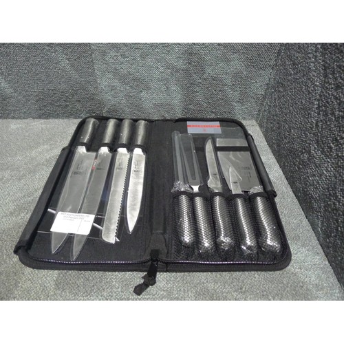 1023 - A 9 piece chefs knife set by Samurai with case