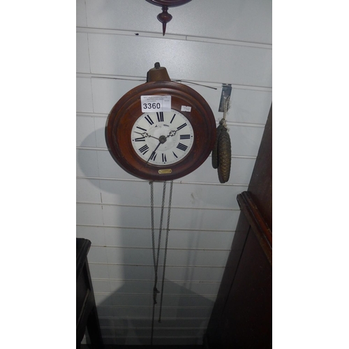 3360 - 1 wall clock with a bell and two metal pine cone weights by J Schofield, Ramsbottom