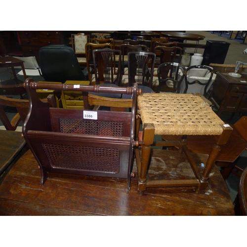 3386 - A small rush seat stool and a dark wood magazine rack