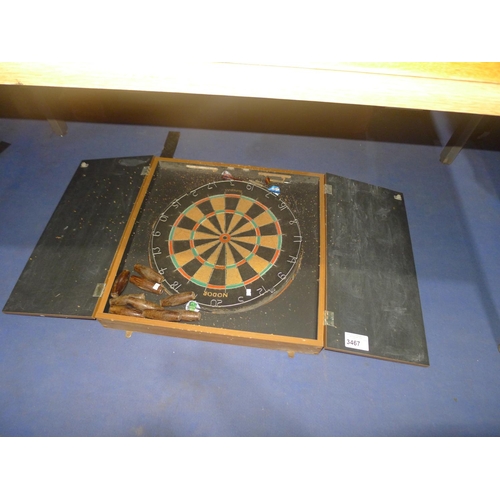 3467 - A dartboard with doors and a set of miniature skittles