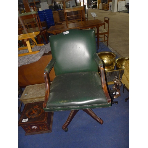 3499 - Vintage swivel office chair with green leather upholstery