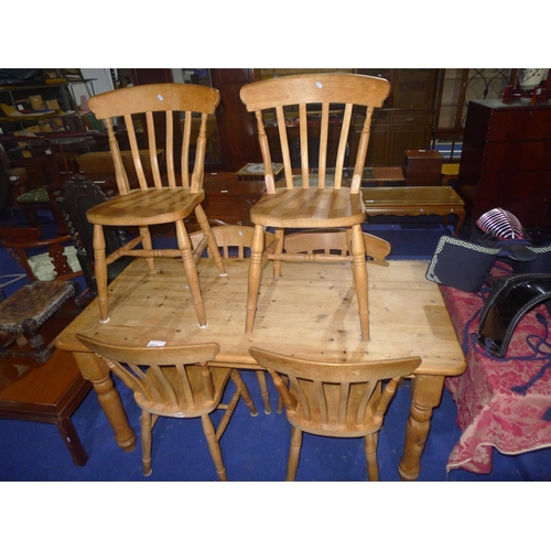 3511 - A rectangular topped pine kitchen table with 6 slat back chairs