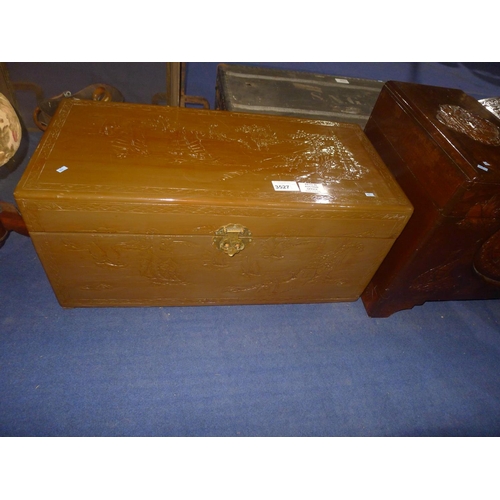 3527 - A carved a camphor wood chest with a lift lid, approximately 94 cm wide