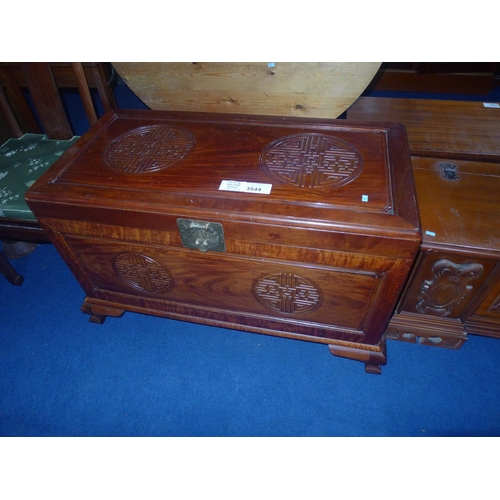 3544 - Carved oriental camphor wood chest with a lift lid, approximately 103 cm wide