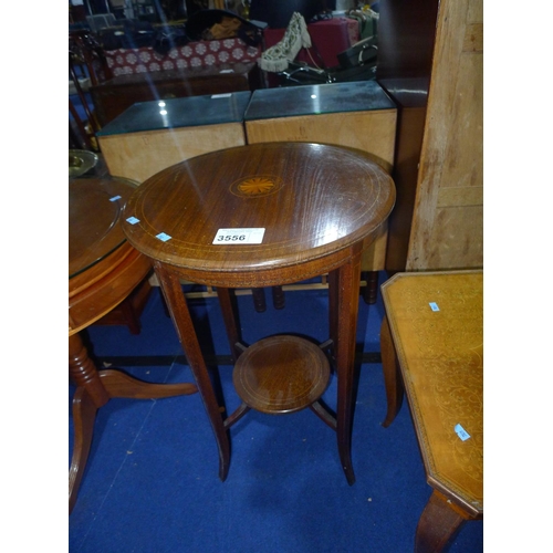 3556 - An Edwardian marquetry inlaid mahogany circular topped occasional table with shelf under