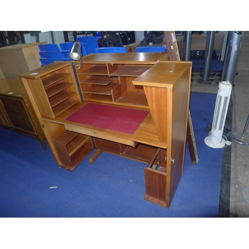 3563 - A vintage cabinet opening to a fitted desk/workstation approximately 84cm wide when closed