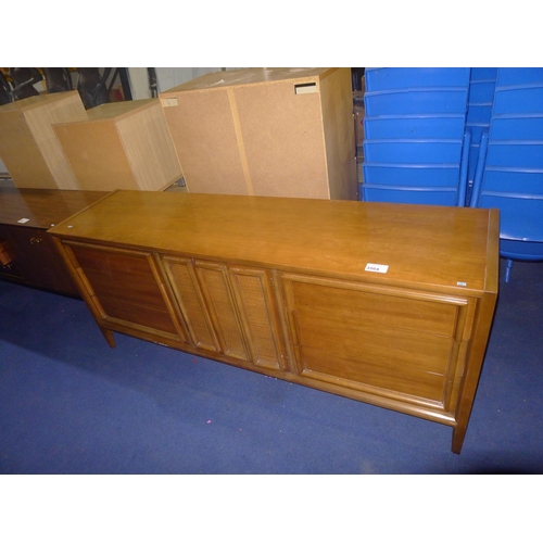 3564 - A 1980s vintage medium wood sideboard with drawers and cupboards, approximately 188cm wide