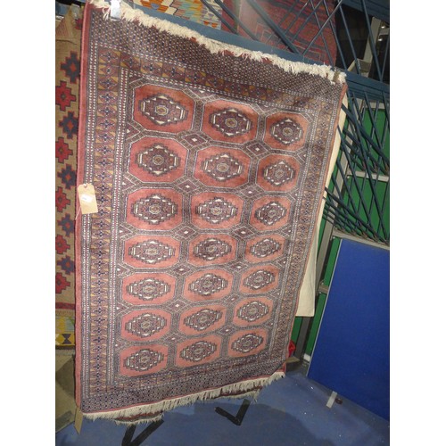 3344 - A multi-coloured oriental rug 180cm x125cm