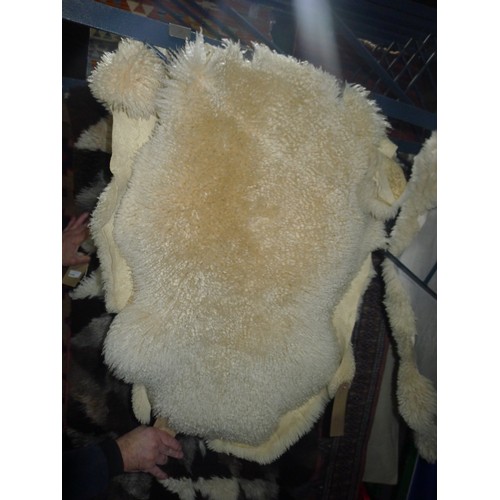 3347 - 3 small sheepskin rugs