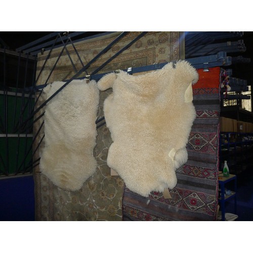 3347 - 3 small sheepskin rugs