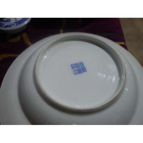 3311 - A large quantity of miscellaneous decorative blue and white oriental patterned chinaware and other b... 