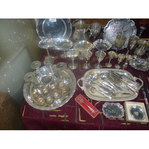 3310 - A large quantity of miscellaneous decorative silver-plated ware, cutlery and other metalware etc