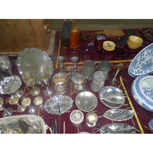 3310 - A large quantity of miscellaneous decorative silver-plated ware, cutlery and other metalware etc