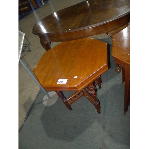 3399 - An Edwardian octagonal topped mahogany occasional table on turned legs