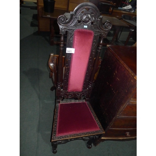 3421 - A carved Oak high back hall chair