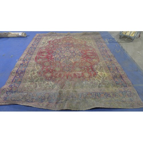 3494 - A multi-coloured floral patterned carpet approximately 380 cm x 300 cm