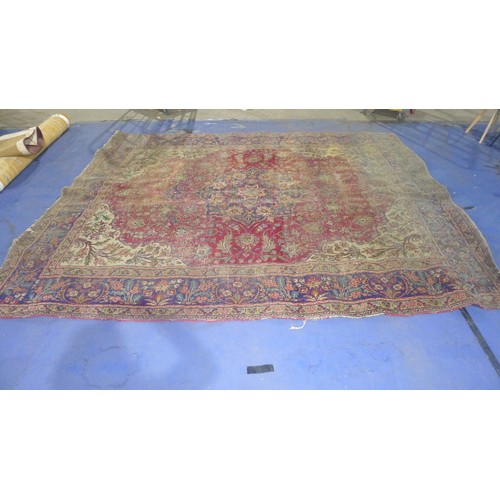 3494 - A multi-coloured floral patterned carpet approximately 380 cm x 300 cm