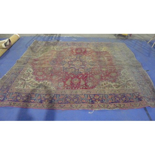 3494 - A multi-coloured floral patterned carpet approximately 380 cm x 300 cm