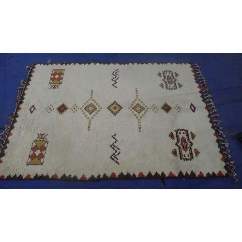 3495 - A brown and white patterned carpet approx 300 cm x 210 cm