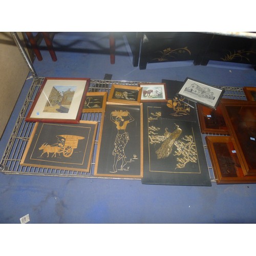 3491 - Several framed engraved copper pictures and a quantity of framed wooden and silk pictures (one shelf... 