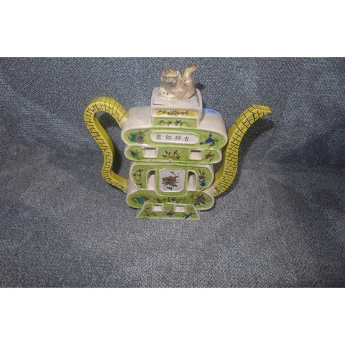 3314 - A Chinese Buddha, two Chinese teapots and a quantity of miscellaneous decorative Chinese and other c... 