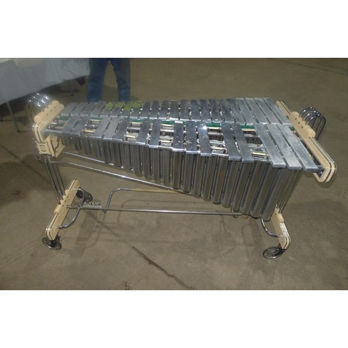 3097 - A 1950s vintage Electric Boosey and Hawkes Ajax vibraphone with metal keys, approximately 145cms lon... 