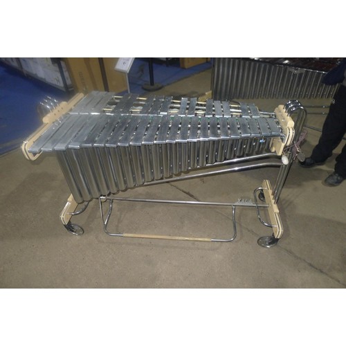 3097 - A 1950s vintage Electric Boosey and Hawkes Ajax vibraphone with metal keys, approximately 145cms lon... 