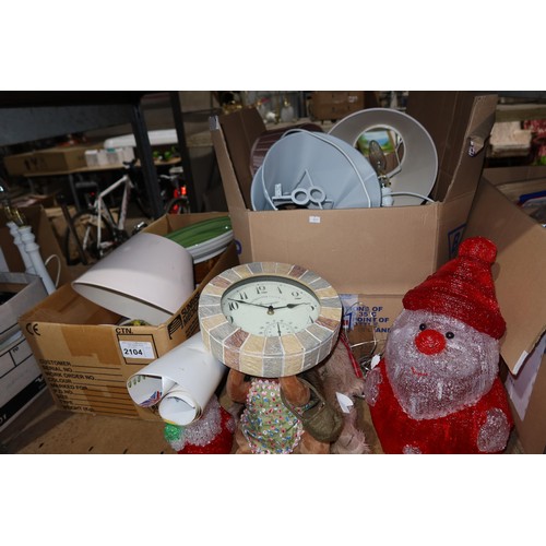 2104 - A quantity of various household items including Christmas decorations, crockery, glassware, table la... 