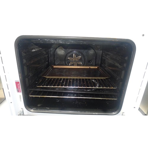 1040 - An integrated white household oven by Hotpoint type SY36W - trade