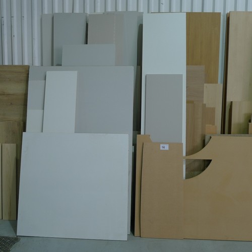 16 - A quantity of various sheet material off cuts comprising of grey faced, white faced, wood faced etc ... 