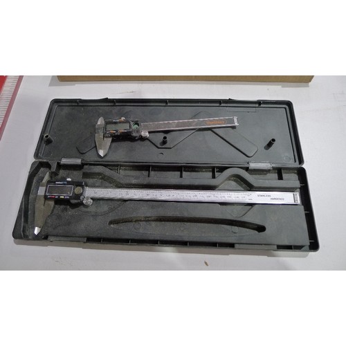 64 - A large Perspex set square approx 160 x 100cm, a spirit level, 2 Vernier calipers and a handle / kno... 