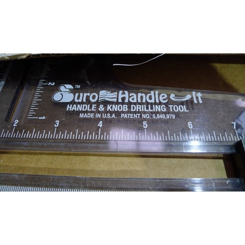 64 - A large Perspex set square approx 160 x 100cm, a spirit level, 2 Vernier calipers and a handle / kno... 