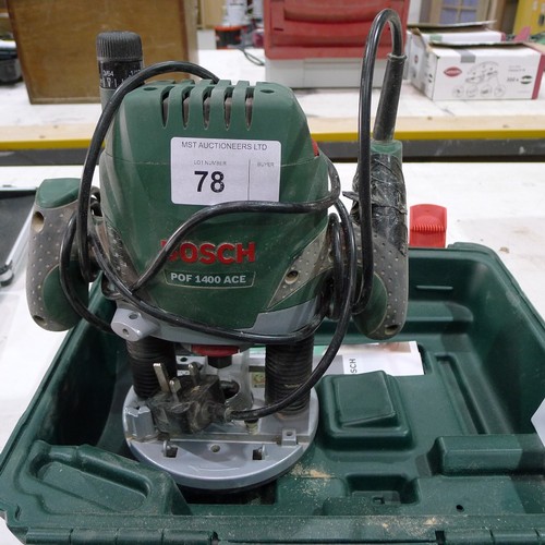 78 - A Bosch router type POF 1400 ACE, 240v, supplied with a fence and a plastic carry case