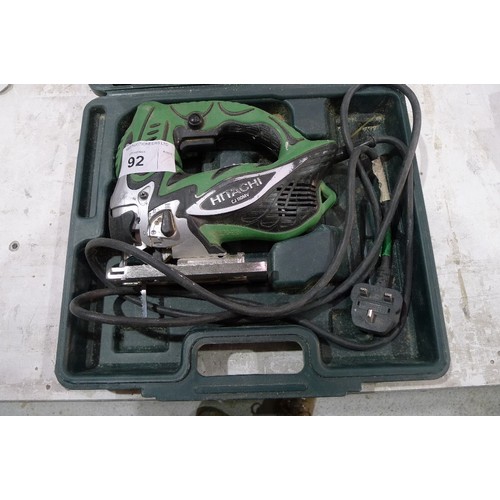 92 - 1 Hitachi jigsaw type CJ110MV, 240v, and 1 Hitachi angle grinder type G12SR3, 240v with several disk... 