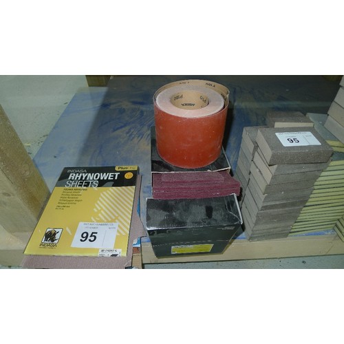 95 - A quantity of various abrasives including sheets, a part roll of Mirka P180, pads and blocks