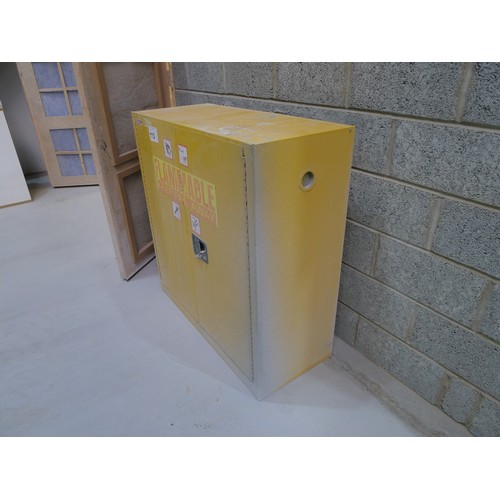 113 - A yellow metal two door storage cabinet approx 109 x 45 x 112 cm high