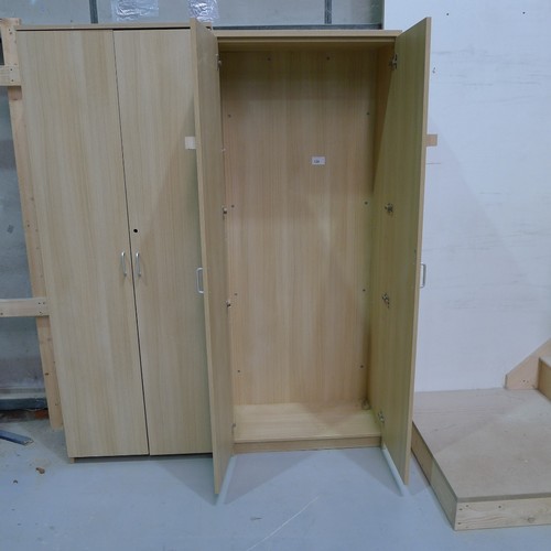 129 - 2 wood effect two door storage cabinets each approx 80 x 40 x 200cm high, one of which contains vari... 