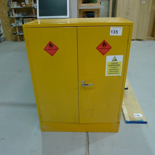 135 - A yellow metal two door COSHH cabinet approx 91 x 46 x 122cm high