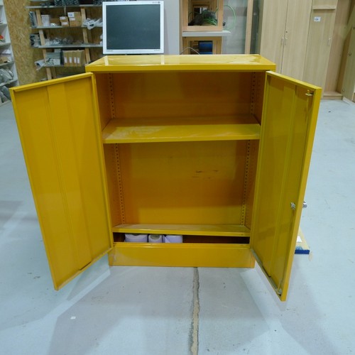 135 - A yellow metal two door COSHH cabinet approx 91 x 46 x 122cm high