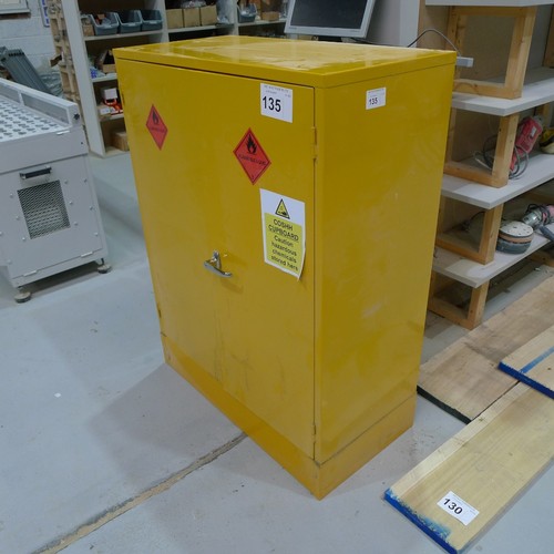 135 - A yellow metal two door COSHH cabinet approx 91 x 46 x 122cm high