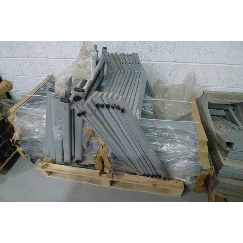 140 - 5 pallets containing a quantity of various grey metal table frame parts